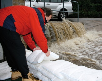 FloodSax sandless sandbags stopping a torrent of floodwater