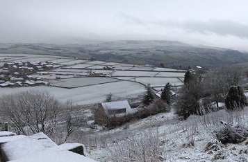 Aftermath of a sleet shower at Scapegoat Hill high above Huddersfield