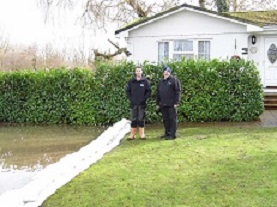 This barrier made from FloodSax alternative sandbags stopped water creeping up a garden