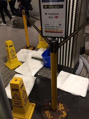FloodSax alternative sandbags soaking up water on the London Underground at Liverpool Street Station