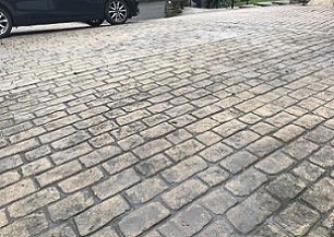Car on a patterned imprinted concrete drive